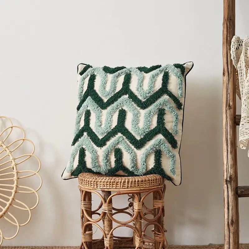 Geometric tufted embroidered pillow