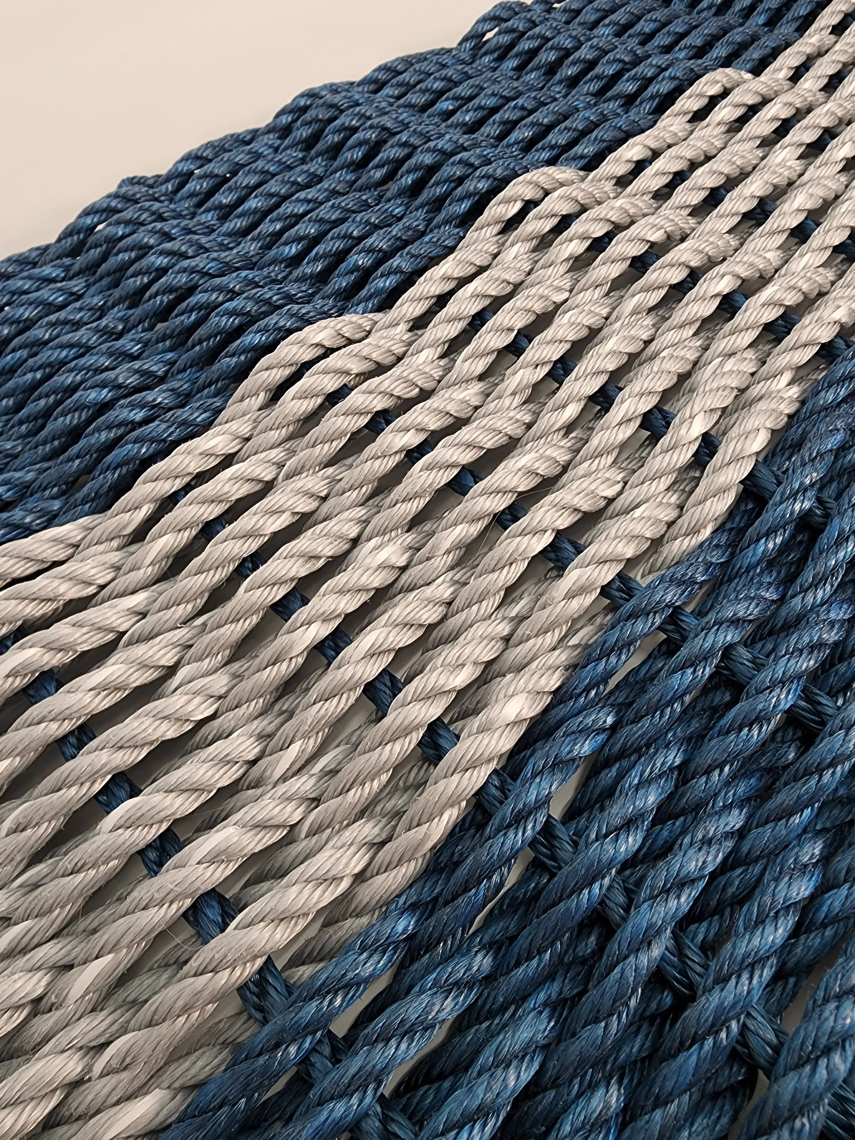 Navy and light gray rope doormat