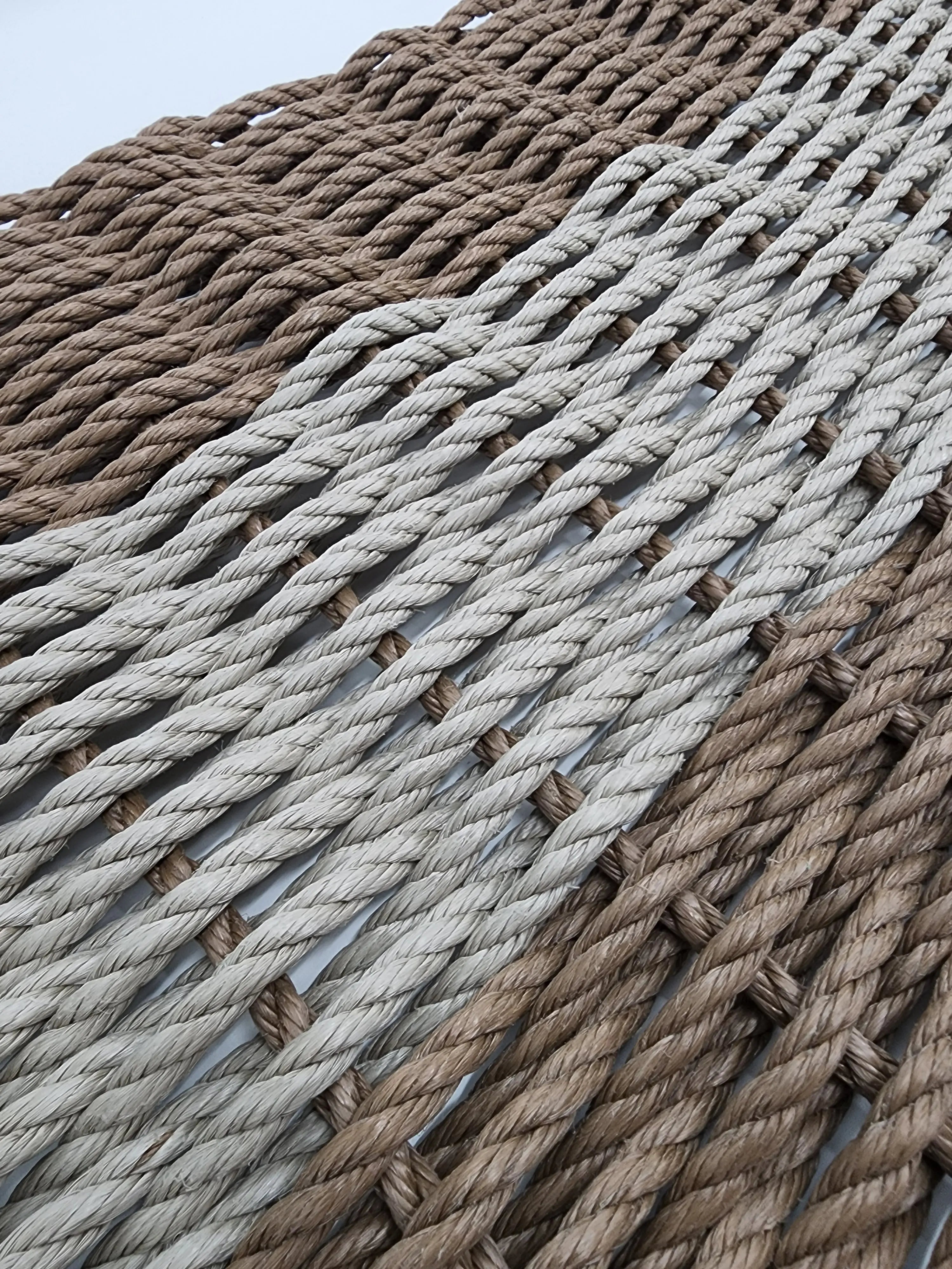 Brown and tan rope doormat