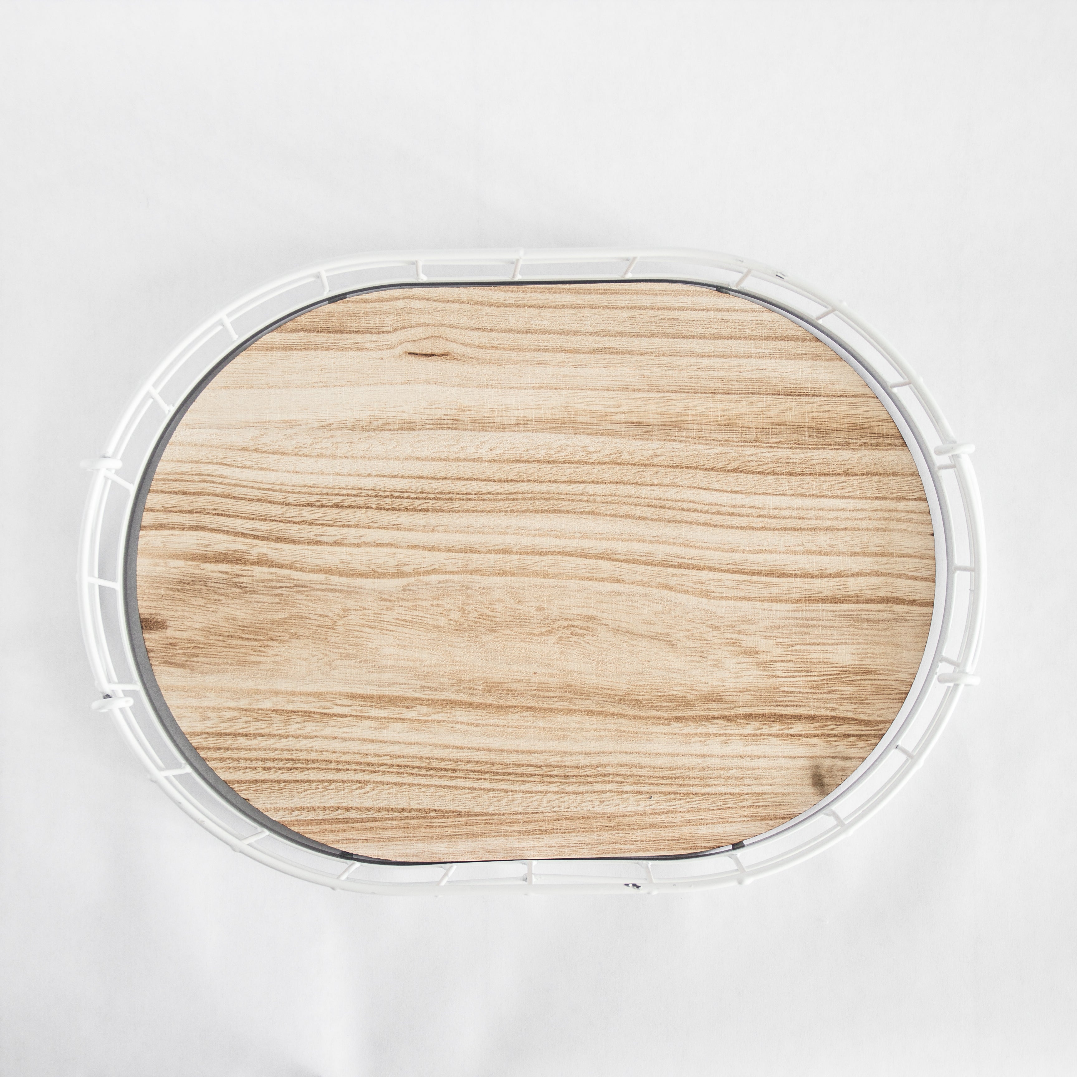 Oval metal and wood decorative tray top view