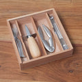 French twelve-piece stainless steel seafood serving set in wooden box