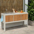 Portals Light outdoor kitchen with sink and cutting board