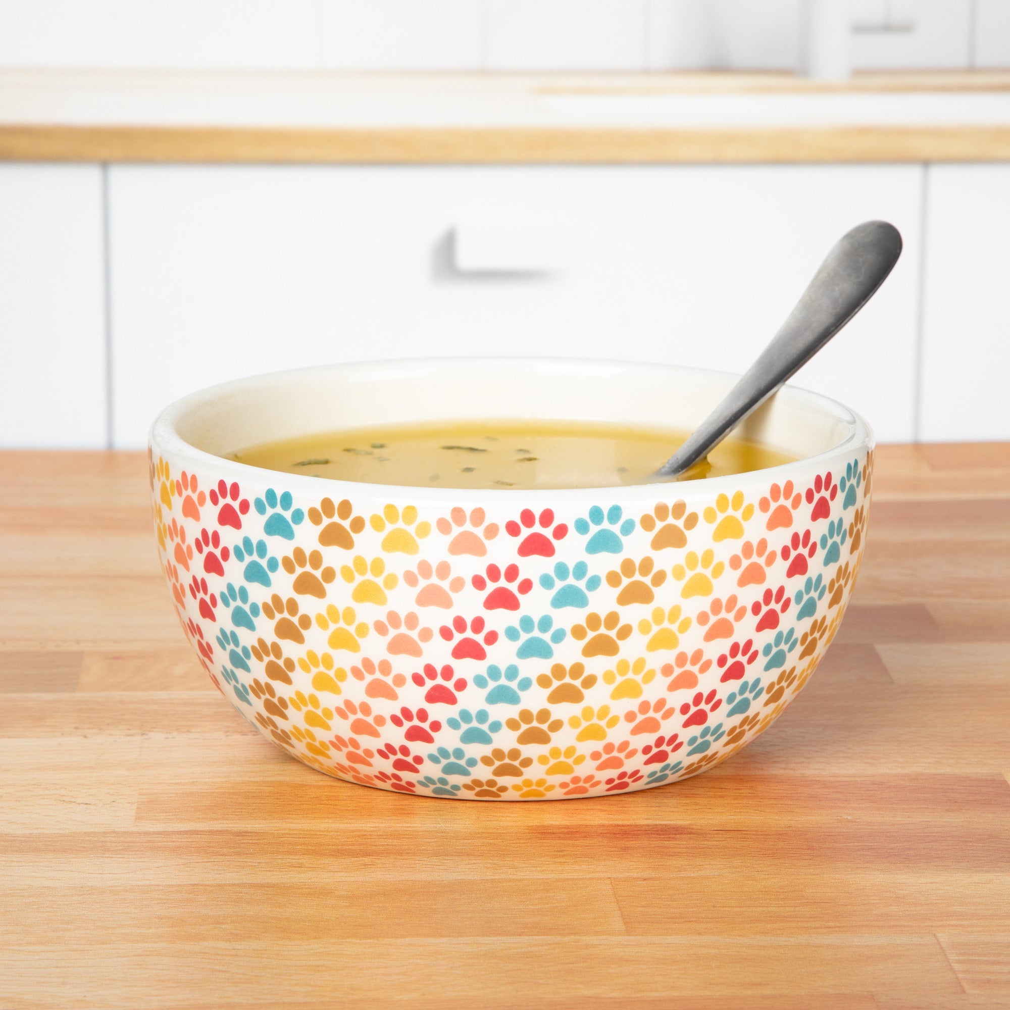 Ceramic paw-design bowls lifestyle image