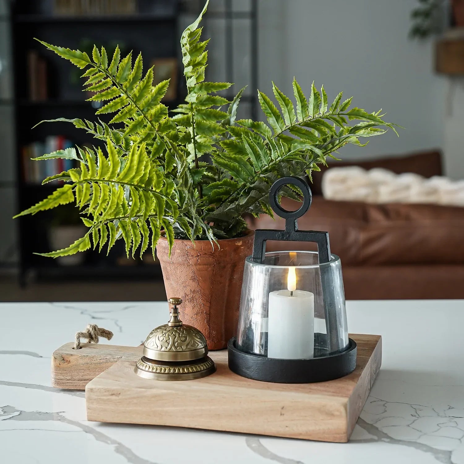 Faux fern in terracotta pot
