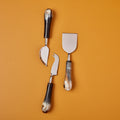 Horn and stainless steel cheese serving set