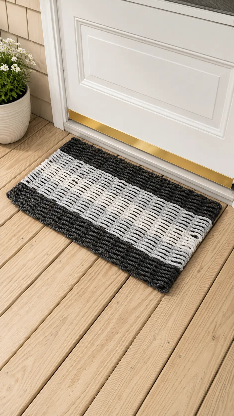 Black, gray and white rope doormat