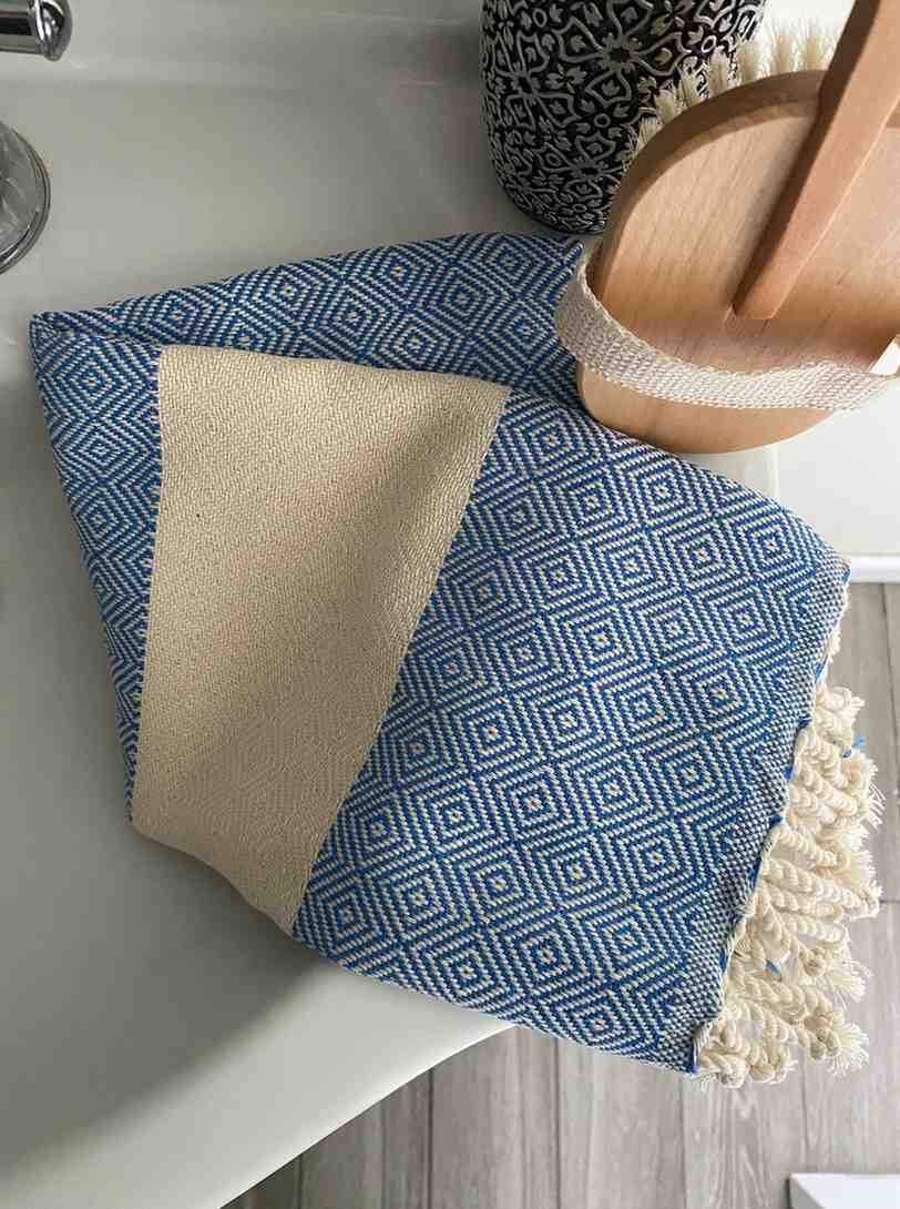 Folded blue diamond hand towel