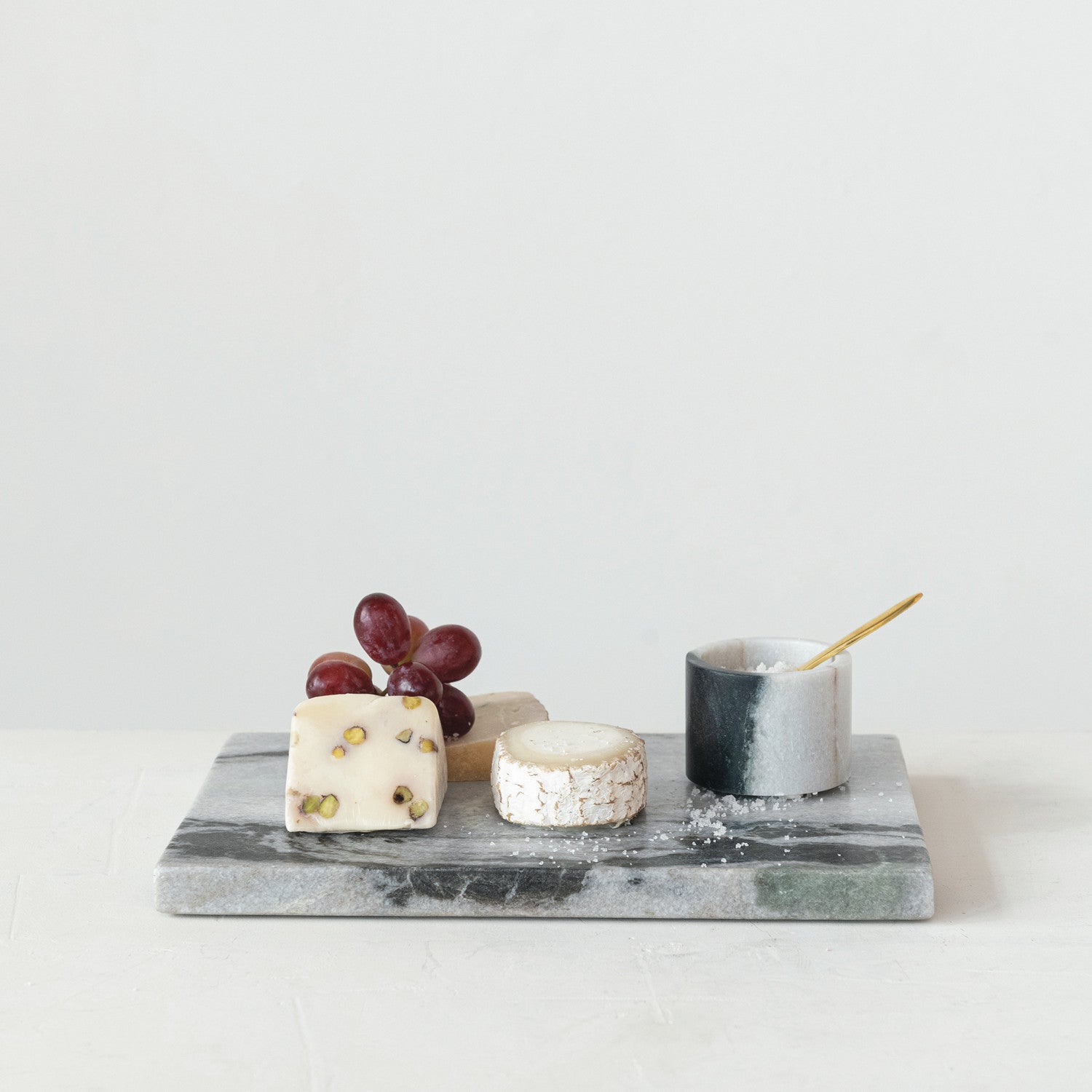 Marble salt cellar with brass spoon