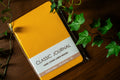 Yellow hardcover linen journal