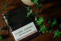 Black hardcover linen journal