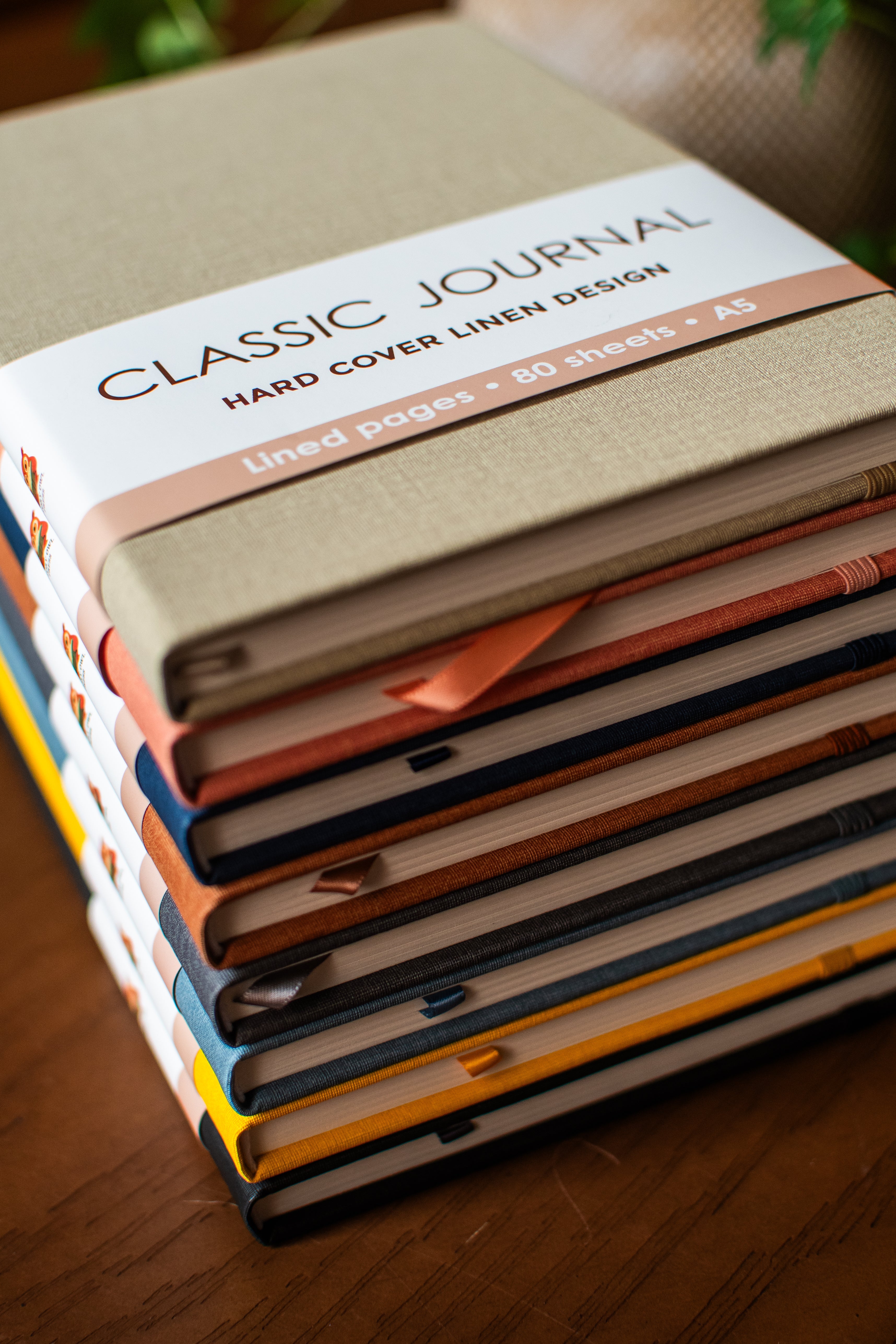 Colorful linen journal set with eight A5 journals