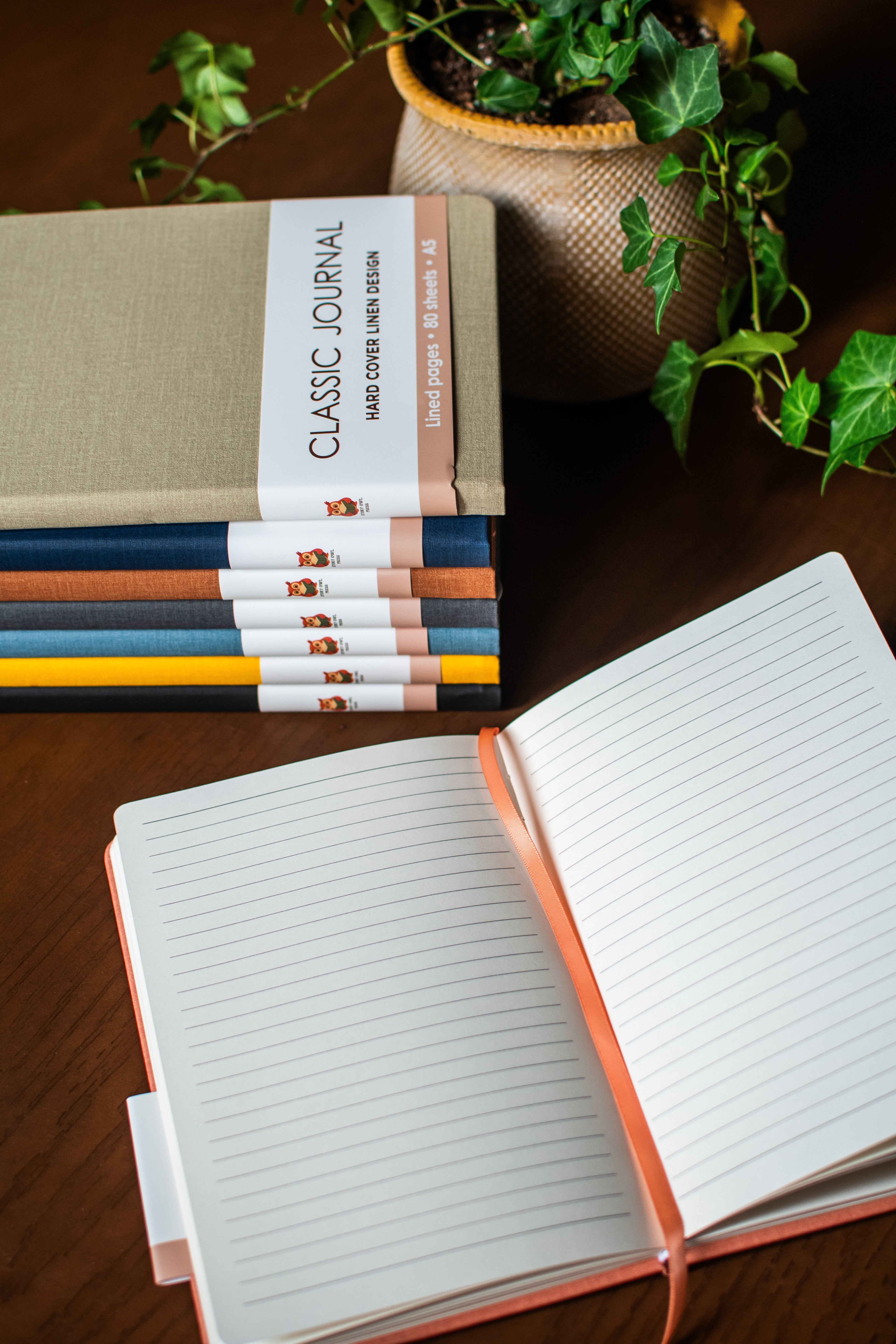 Colorful linen journal set with eight A5 journals
