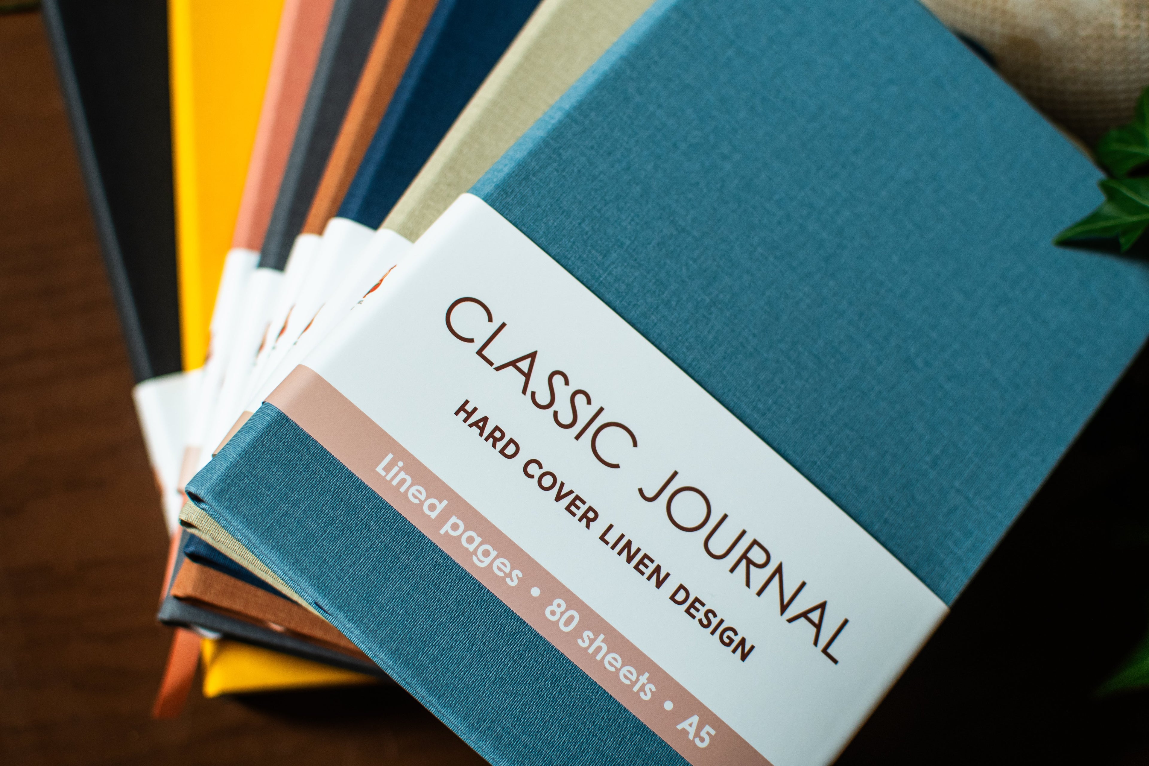 Colorful linen journal set with eight A5 journals