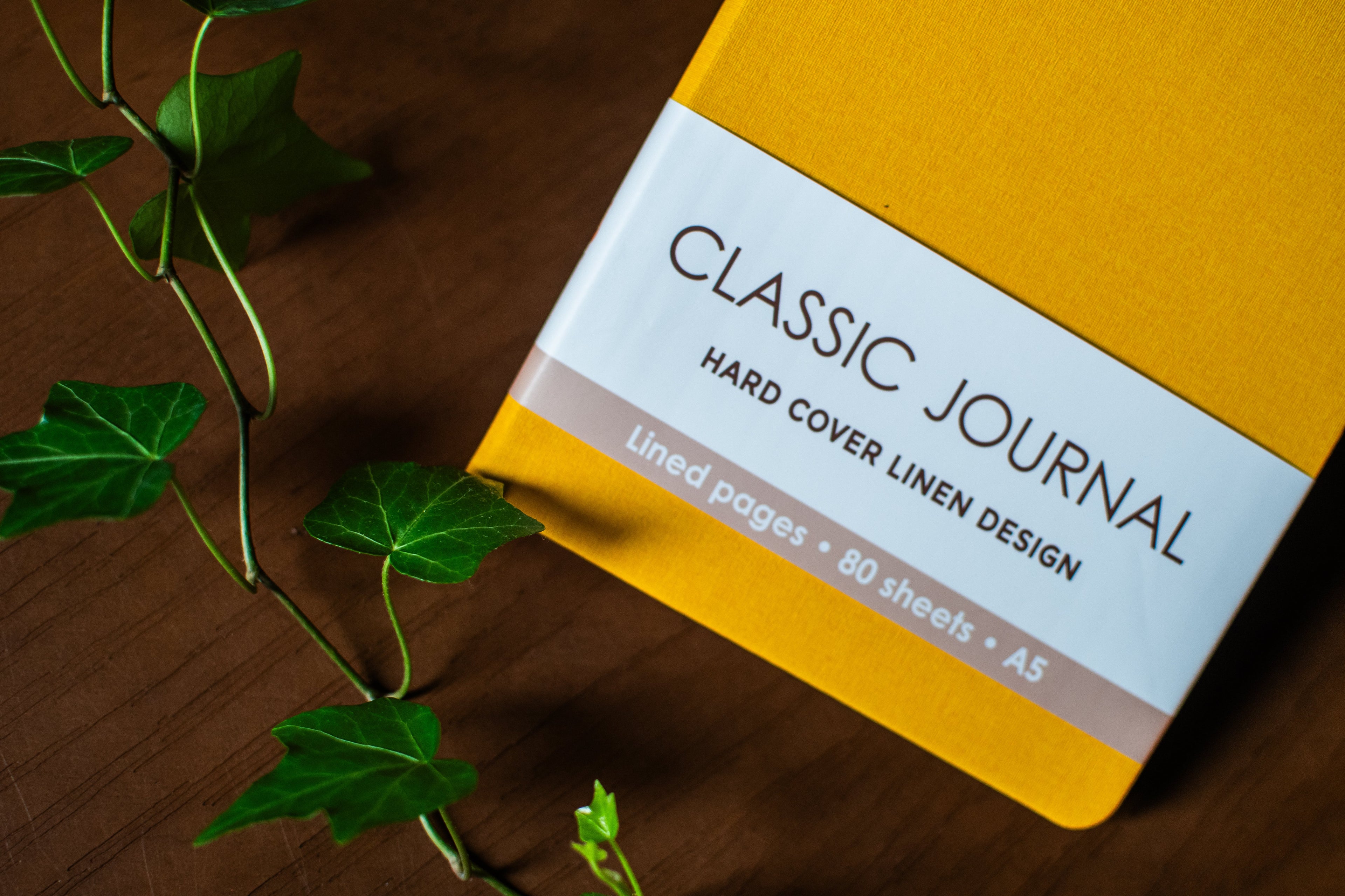 Yellow hardcover linen journal