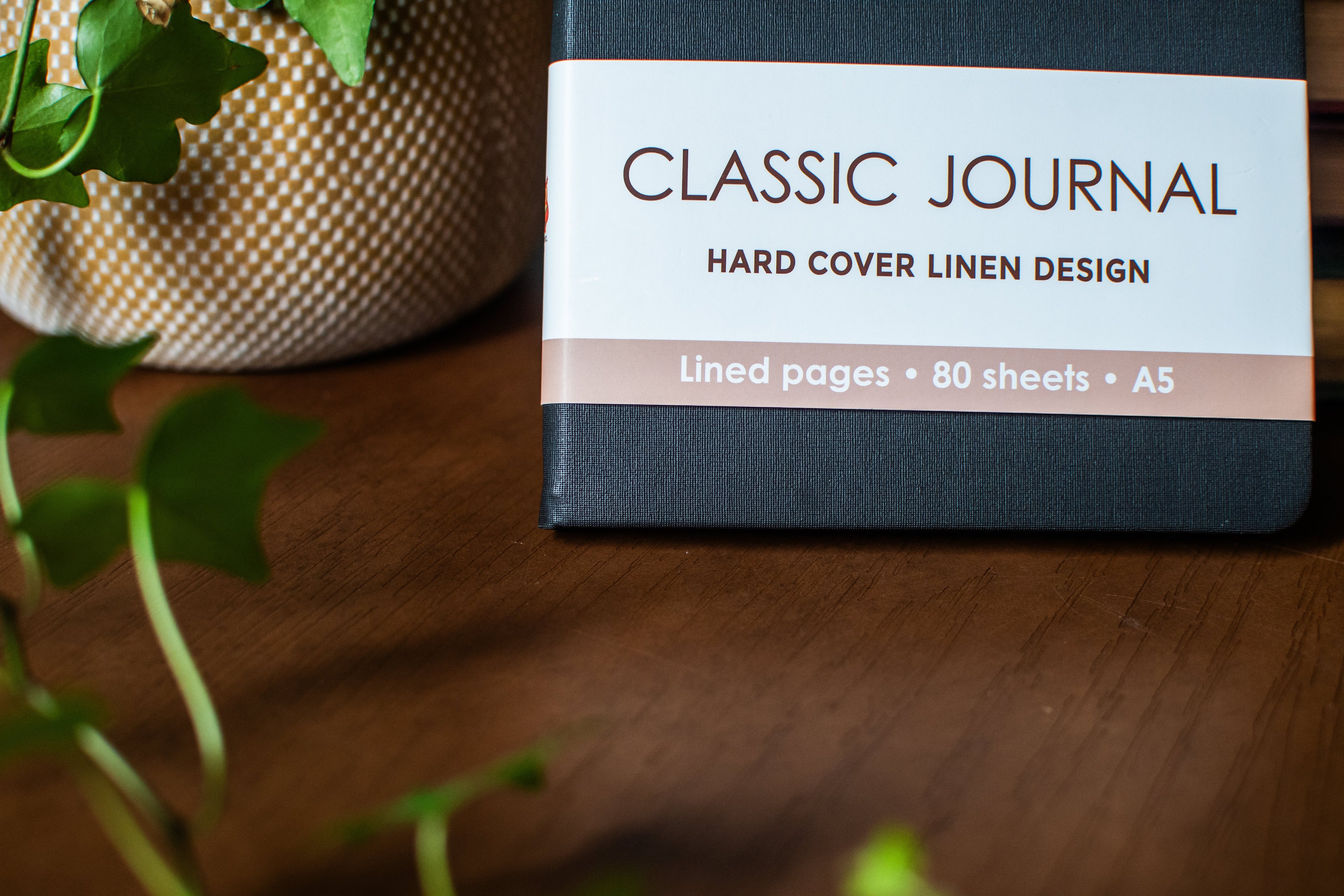 Black hardcover linen journal