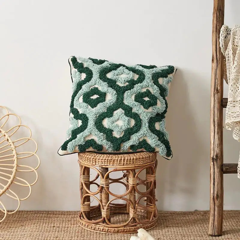 Geometric tufted embroidered pillow