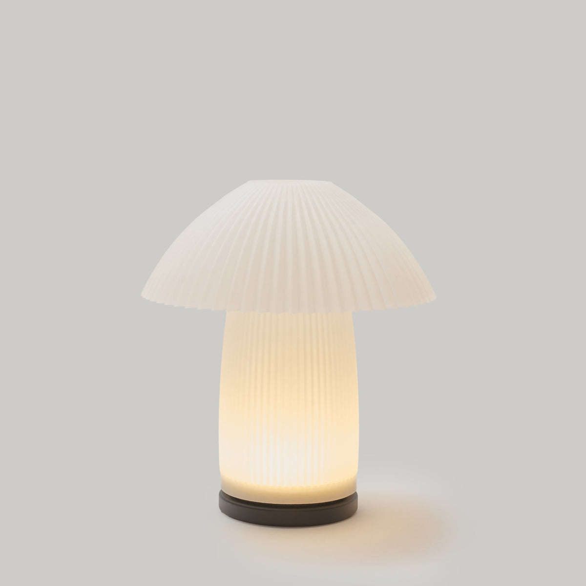 Cordless Kinoko pleated mushroom lamp by Wooj Design
