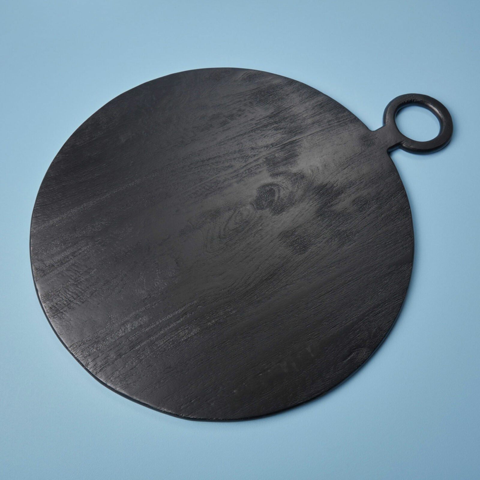 Black mango wood serving board