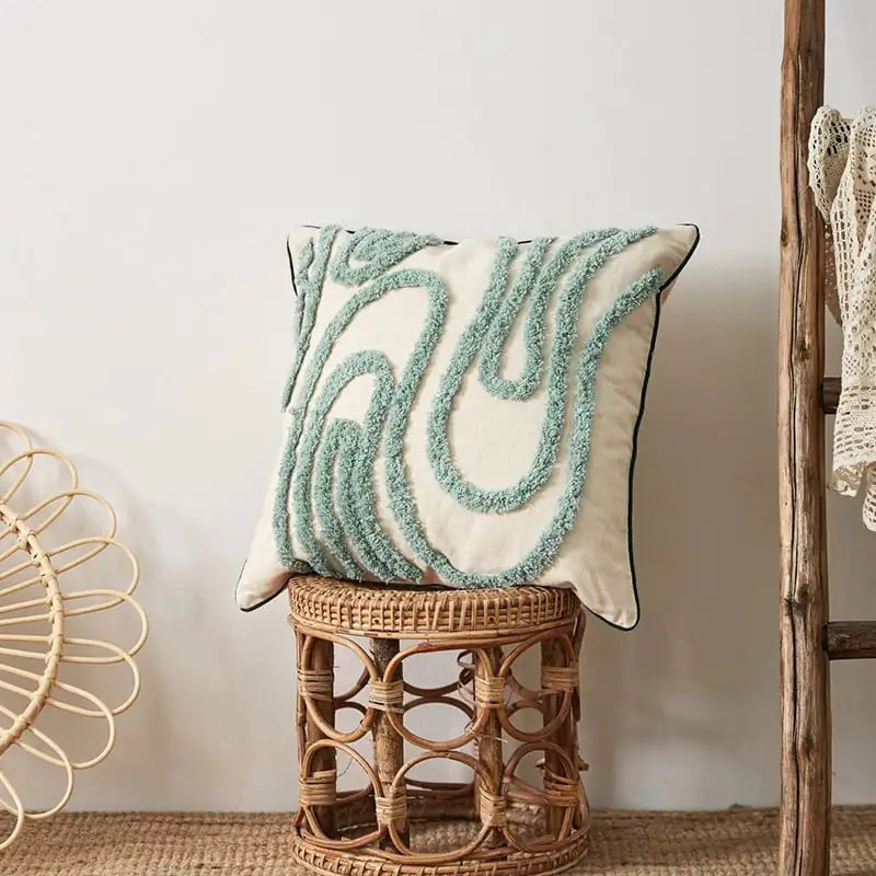 Geometric tufted embroidered pillow