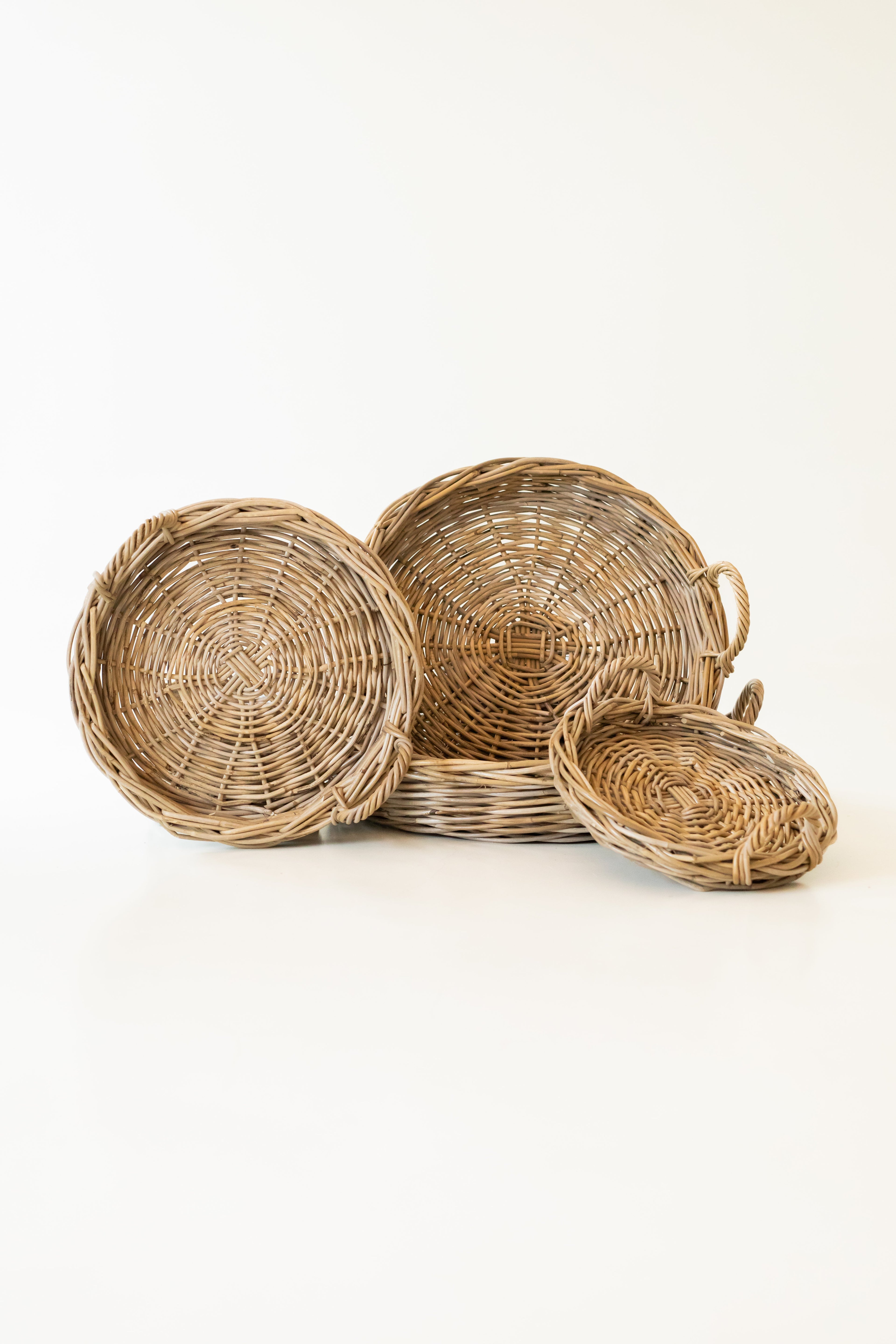 Low round woven rattan tray