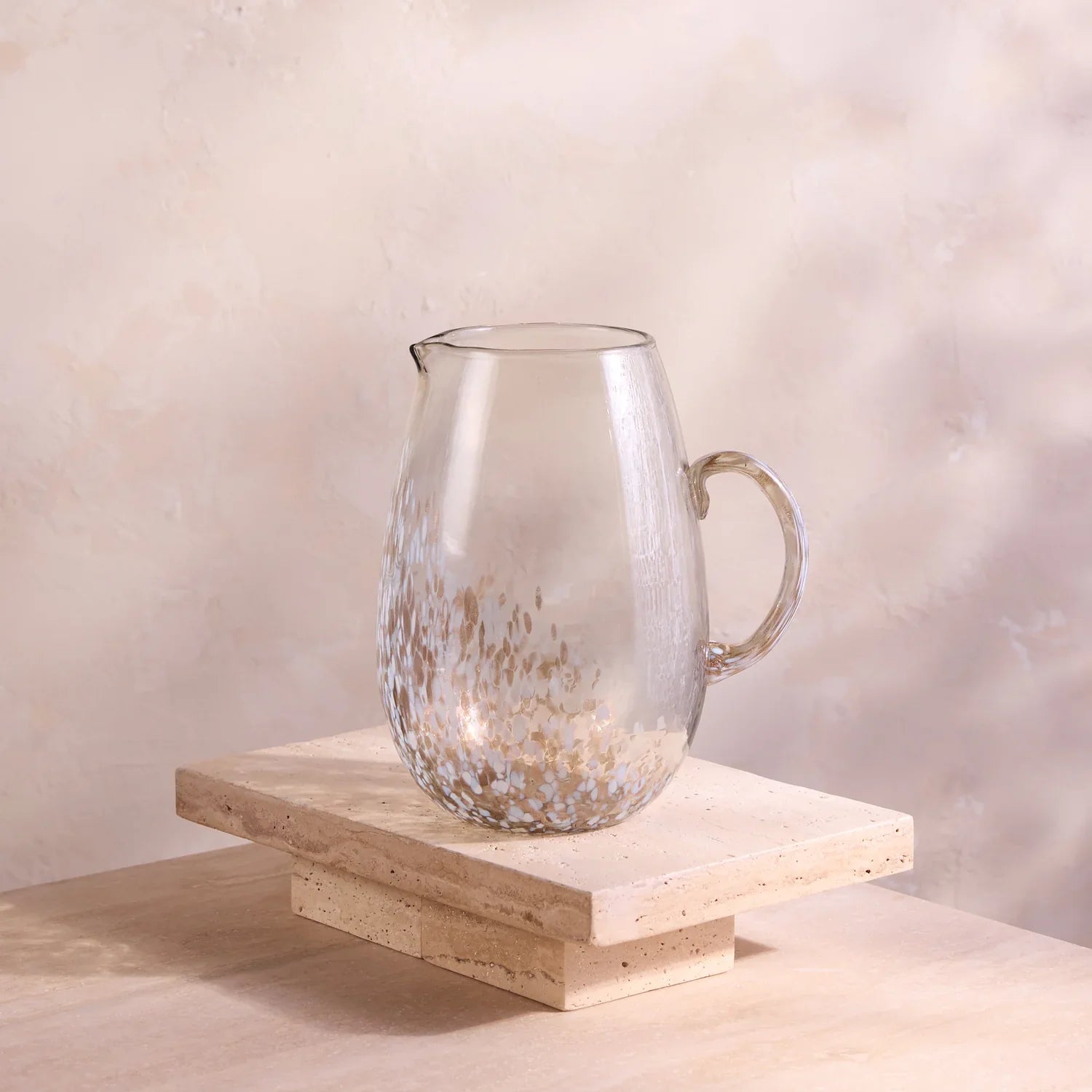 Mio mouth-blown recycled glass pitcher with metallic accents