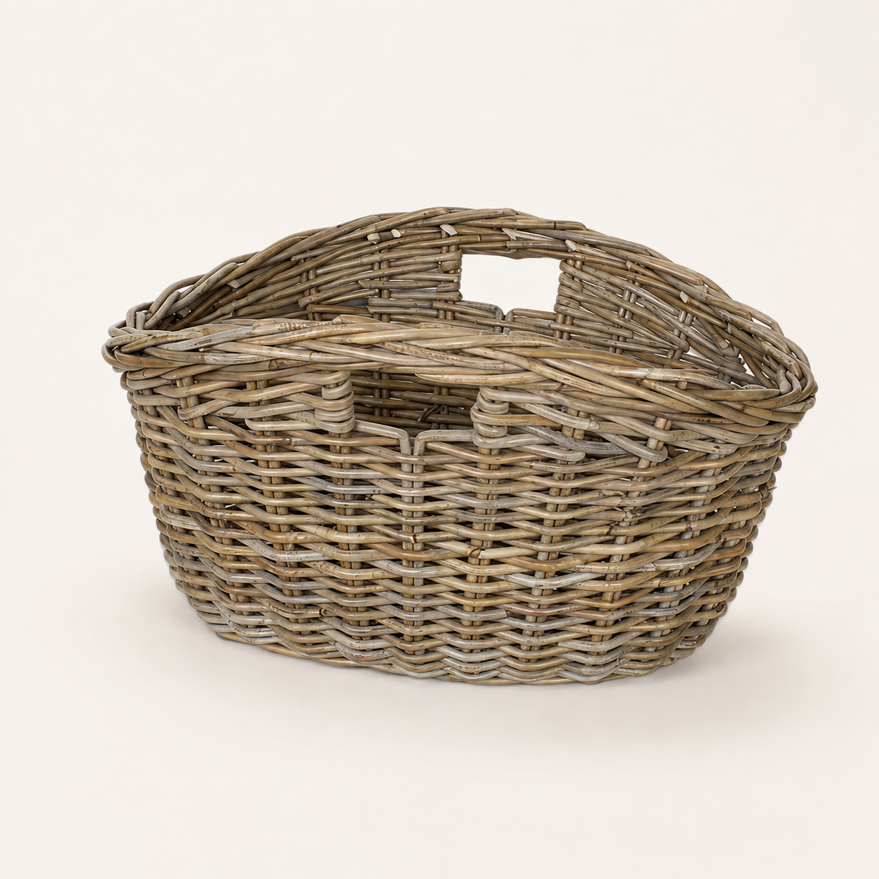 Low oval rattan storage basket