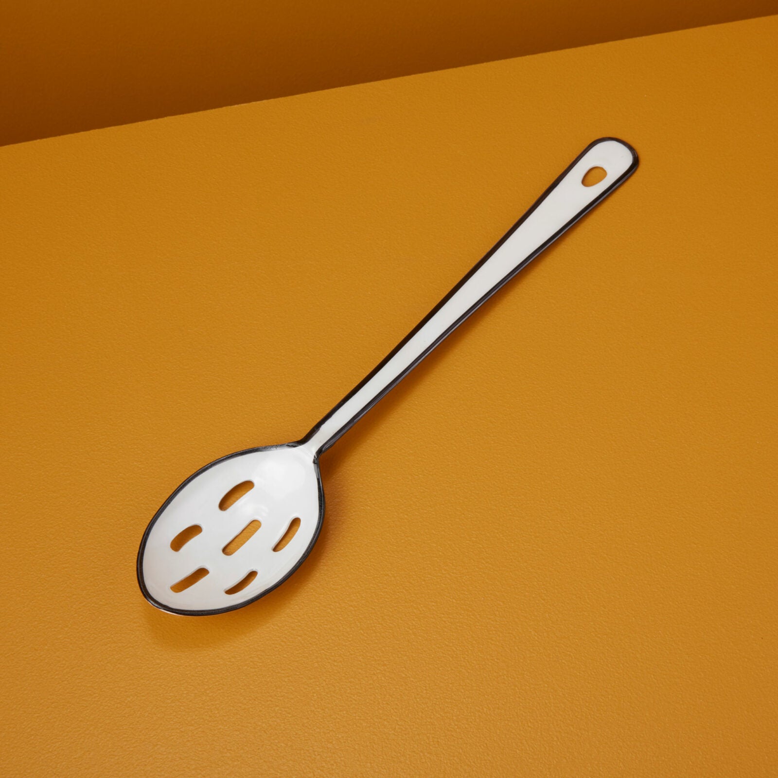 Hani white enamel slotted serving spoon