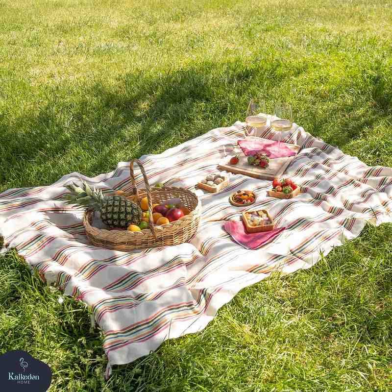 Rainbow Turkish blanket used for a picnic
