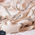 Turkish muslin cotton throw blanket in a living room